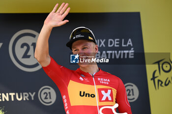 2024-06-30 - JONAS ABRAHAMSEN celebrated for the prix de la combativite on the podium of the second stage of the tour de france 2024 in bologna - STAGE 2 - FINISH - TOUR DE FRANCE - CYCLING