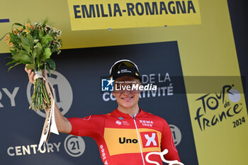 2024-06-30 - JONAS ABRAHAMSEN celebrated for the prix de la combativite on the podium of the second stage of the tour de france 2024 in bologna - STAGE 2 - FINISH - TOUR DE FRANCE - CYCLING