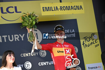 2024-06-30 - JONAS ABRAHAMSEN celebrated for the prix de la combativite on the podium of the second stage of the tour de france 2024 in bologna - STAGE 2 - FINISH - TOUR DE FRANCE - CYCLING