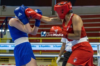 2024-03-06 - Gemini Melissa (Ita) in red and Wojcik Elzbieta (Pol) in blue during the Boxing Road to Paris 1st World Qualification Tournament, at E-Work Arena, Busto Arsizio, Italy on March 6, 2024 - BOXING ROAD TO PARIS - BOXING - CONTACT