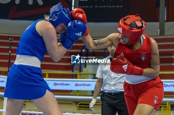 06/03/2024 - Gemini Melissa (Ita) in red and Wojcik Elzbieta (Pol) in blue during the Boxing Road to Paris 1st World Qualification Tournament, at E-Work Arena, Busto Arsizio, Italy on March 6, 2024 - BOXING ROAD TO PARIS - BOXE - CONTATTO