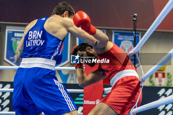 06/03/2024 - Azhar (Pak) and Latypov Danis (Brn) during the Boxing Road to Paris 1st World Qualification Tournament, at E-Work Arena, Busto Arsizio, Italy on March 6, 2024 - BOXING ROAD TO PARIS - BOXE - CONTATTO