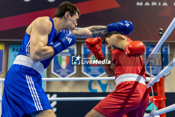 2024-03-06 - Azhar (Pak) and Latypov Danis (Brn) during the Boxing Road to Paris 1st World Qualification Tournament, at E-Work Arena, Busto Arsizio, Italy on March 6, 2024 - BOXING ROAD TO PARIS - BOXING - CONTACT