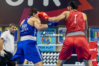 2024-03-06 - Azhar (Pak) and Latypov Danis (Brn) during the Boxing Road to Paris 1st World Qualification Tournament, at E-Work Arena, Busto Arsizio, Italy on March 6, 2024 - BOXING ROAD TO PARIS - BOXING - CONTACT