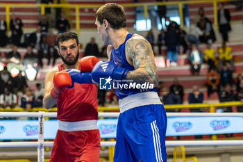 06/03/2024 - Azhar (Pak) and Latypov Danis (Brn) during the Boxing Road to Paris 1st World Qualification Tournament, at E-Work Arena, Busto Arsizio, Italy on March 6, 2024 - BOXING ROAD TO PARIS - BOXE - CONTATTO