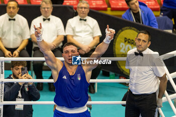 2024-03-11 - Lenzi Diego (Ita) in blue during the Boxing Road to Paris 1st World Qualification Tournament, at E-Work Arena, Busto Arsizio, Italy on March 11, 2024 - BOXING ROAD TO PARIS - BOXING - CONTACT