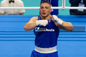 2024-03-11 - Lenzi Diego (Ita) in blue during the Boxing Road to Paris 1st World Qualification Tournament, at E-Work Arena, Busto Arsizio, Italy on March 11, 2024 - BOXING ROAD TO PARIS - BOXING - CONTACT