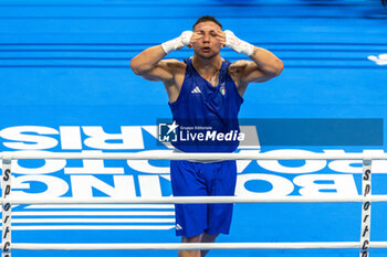 11/03/2024 - Lenzi Diego (Ita) in blue during the Boxing Road to Paris 1st World Qualification Tournament, at E-Work Arena, Busto Arsizio, Italy on March 11, 2024 - BOXING ROAD TO PARIS - BOXE - CONTATTO