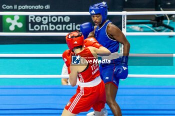 2024-03-11 - Carini Angela (Ita) in red and Moreira Ivanusa (Cpv) in blue during the Boxing Road to Paris 1st World Qualification Tournament, at E-Work Arena, Busto Arsizio, Italy on March 11, 2024 - BOXING ROAD TO PARIS - BOXING - CONTACT