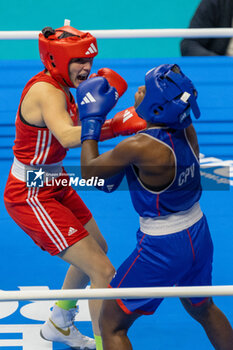 11/03/2024 - Carini Angela (Ita) in red and Moreira Ivanusa (Cpv) in blue during the Boxing Road to Paris 1st World Qualification Tournament, at E-Work Arena, Busto Arsizio, Italy on March 11, 2024 - BOXING ROAD TO PARIS - BOXE - CONTATTO