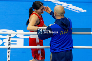 2024-03-11 - Carini Angela (Ita) in red and Moreira Ivanusa (Cpv) in blue during the Boxing Road to Paris 1st World Qualification Tournament, at E-Work Arena, Busto Arsizio, Italy on March 11, 2024 - BOXING ROAD TO PARIS - BOXING - CONTACT