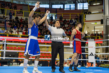 11/03/2024 - Paraschiv Alexandru (Mda) in red and Alkasbeh Obada (Jor) in blue during the Boxing Road to Paris 1st World Qualification Tournament, at E-Work Arena, Busto Arsizio, Italy on March 11, 2024 - BOXING ROAD TO PARIS - BOXE - CONTATTO