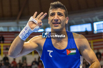 11/03/2024 - Alkasbeh Obada (Jor) in blue during the Boxing Road to Paris 1st World Qualification Tournament, at E-Work Arena, Busto Arsizio, Italy on March 11, 2024 - BOXING ROAD TO PARIS - BOXE - CONTATTO