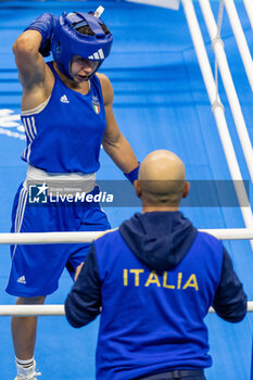 2024-03-11 - Mesiano Alessia (Ita) in blue during the Boxing Road to Paris 1st World Qualification Tournament, at E-Work Arena, Busto Arsizio, Italy on March 11, 2024 - BOXING ROAD TO PARIS - BOXING - CONTACT