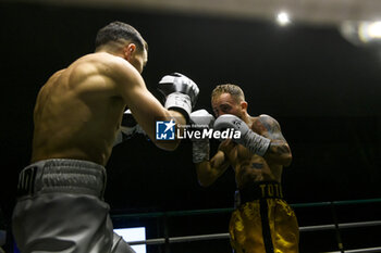 2024-07-05 - Salavatore Contino and Mohammed Obbadi during their boxing match valid for the Italian men's bantamweight title - TITOLO ITALIANO PESI GALLO - CONTINO VS OBBADI - BOXING - CONTACT