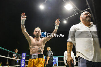 2024-07-05 - Salvatore Contino exults at the end of the boxing match valid for the Italian men's bantamweight title against Mohammed Obbadi - TITOLO ITALIANO PESI GALLO - CONTINO VS OBBADI - BOXING - CONTACT