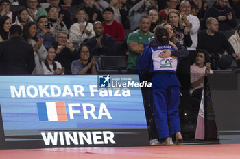 02/02/2024 - MOKDAR FAIZA (FRA) (PARIS SAINT GERMAIN JUDO 75) won against KLIMKAIT Jessica (CAN) in semi final women -57kg women category, celebration in arms of her trainer during the Paris Grand Slam 2024, IJF Judo event, 50th anniversary, on February 2, 2024 at Accor Arena in Paris, France - JUDO - PARIS GRAND SLAM 2024 - JUDO - CONTATTO