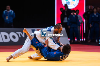 02/02/2024 - Luka MKHEIDZE (FRA) against Doston RUZIEV (UZB), Round of 16 -60Kg, during the Paris Grand Slam 2024, IJF Judo event on February 2, 2024 at Accor Arena in Paris, France - JUDO - PARIS GRAND SLAM 2024 - JUDO - CONTATTO