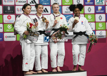 02/02/2024 - Christa Deguchi of Canada Silver medal, Faiza Mokdar of France Gold medal, Jessica Klimkait of Canada Bronze medal and Sarah-Léonie Cysique of France Bronze medal, Women's -57 kg during the Paris Grand Slam 2024, IJF Judo event on February 2, 2024 at Accor Arena in Paris, France - JUDO - PARIS GRAND SLAM 2024 - JUDO - CONTATTO
