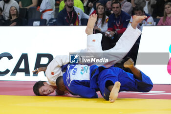 03/02/2024 - Tizie Gnamien of France and Timur Arbuzov of Individual Neutral Athletes, Round 2 Men's -81 Kg during the Paris Grand Slam 2024, IJF Judo event on February 3, 2024 at Accor Arena in Paris, France - JUDO - PARIS GRAND SLAM 2024 - JUDO - CONTATTO
