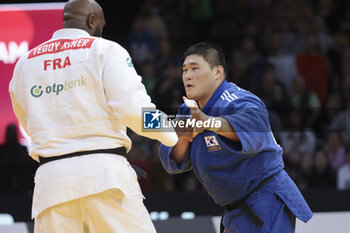 2024-02-04 - Teddy Riner of France (white) fights against Minjong Kim of South Korea (blue) during the Men's +100kg Final of the Paris Grand Slam 2024, an IJF Judo event on February 4, 2024 at Accor Arena in Paris, France - JUDO - PARIS GRAND SLAM 2024 - JUDO - CONTACT