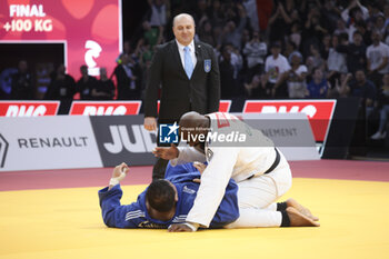 2024-02-04 - Teddy Riner of France (white) celebrates winning against Minjong Kim of South Korea (blue) during the Men's +100kg Final of the Paris Grand Slam 2024, an IJF Judo event on February 4, 2024 at Accor Arena in Paris, France - JUDO - PARIS GRAND SLAM 2024 - JUDO - CONTACT