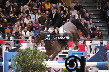 15/03/2024 - Kristaps NERETNIEKS (LAT) riding QUINTES, during the Saut-Hermès, equestrian FEI CSI 5 event on March 15, 2024 at the Grand Palais Éphémère in Paris, France - EQUESTRIAN - THE SAUT HERMES 2024 - INTERNAZIONALI - EQUITAZIONE