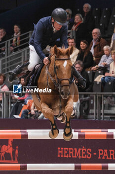 15/03/2024 - Roger Yves BOST (FRA) riding BALLERINE DU VILPION, during the Saut-Hermès, equestrian FEI CSI 5 event on March 15, 2024 at the Grand Palais Éphémère in Paris, France - EQUESTRIAN - THE SAUT HERMES 2024 - INTERNAZIONALI - EQUITAZIONE