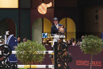 2024-03-15 - Roger Yves BOST (FRA) riding BALLERINE DU VILPION, during the Saut-Hermès, equestrian FEI CSI 5 event on March 15, 2024 at the Grand Palais Éphémère in Paris, France - EQUESTRIAN - THE SAUT HERMES 2024 - INTERNATIONALS - EQUESTRIAN