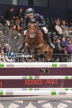 15/03/2024 - Max KUHNER (AUT) riding EIC UP TOO JACCO BLUE during the Saut-Hermès, equestrian FEI CSI 5 event on March 15, 2024 at the Grand Palais Éphémère in Paris, France - EQUESTRIAN - THE SAUT HERMES 2024 - INTERNAZIONALI - EQUITAZIONE
