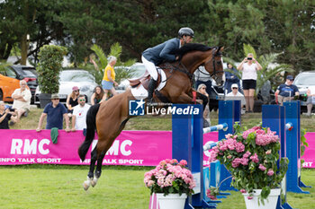 20/07/2024 - Steve Guerdat and DYNAMIX DE BELHEME during the Jumping International de Dinard 2024, CSI 5 Equestrian event on 20 July 2024 at Centre Equestre du Val Porée in Dinard, France - EQUESTRIAN - JUMPING INTERNATIONAL DE DINARD 2024 - INTERNAZIONALI - EQUITAZIONE