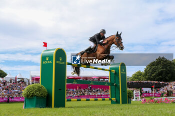 2024-07-21 - Jordan Molga M - Nicolas Delmotte - World Rk.#111, CSI grand Prix Rolex de la ville de Dinard, during the Jumping International de Dinard 2024, CSI 5 Equestrian event on 21 July 2024 at Centre Equestre du Val Porée in Dinard, France - EQUESTRIAN - JUMPING INTERNATIONAL DE DINARD 2024 - INTERNATIONALS - EQUESTRIAN