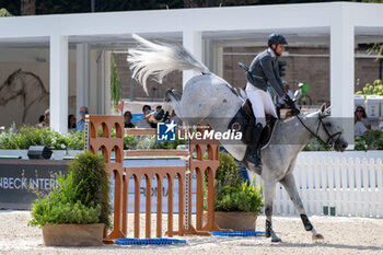 2024-08-31 - Christian Kukuk on Mumbai, of the second place team Riesembeck International, during the first round of the Longines Global Champions League - RIDING LONGINES GLOBAL CHAMPIONS LEAGUE ROME 2024 - INTERNATIONALS - EQUESTRIAN