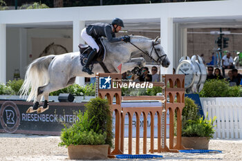 2024-08-31 - Christian Kukuk on Mumbai, of the second place team Riesembeck International, during the first round of the Longines Global Champions League - RIDING LONGINES GLOBAL CHAMPIONS LEAGUE ROME 2024 - INTERNATIONALS - EQUESTRIAN