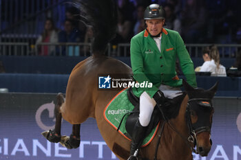 09/11/2024 - Gerfried Puck riding Equitron Ornaat V in action during International Winning Round CSI5*- W Trophy n.5 presented by Crivelli at Jumping Verona, Pala Fimauto on November 9, 2024, Verona, Italy - CSI5*- W PREMIO N.5 PRESENTED BY CRIVELLI WINNING ROUND CATEGORY - INTERNAZIONALI - EQUITAZIONE