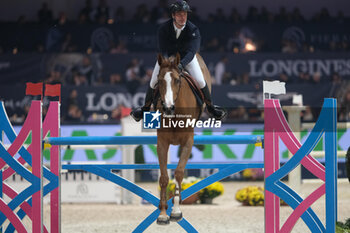 10/11/2024 - Gregory Cottard riding Gammelgaards Carola in action during CSI5*- W Longines FEI Jumping World Cup 2024 Gran Prix presented by KASK, at Pala Fimauto on November 10, 2024, Verona, Italy. - CSI5*-W LONGINES FEI WORLD CUP™ PRESENTED BY KASK GRAN PRIX - INTERNAZIONALI - EQUITAZIONE