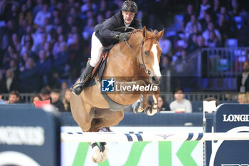 10/11/2024 - Gregory Cottard riding Gammelgaards Carola in action during CSI5*- W Longines FEI Jumping World Cup 2024 Gran Prix presented by KASK, at Pala Fimauto on November 10, 2024, Verona, Italy. - CSI5*-W LONGINES FEI WORLD CUP™ PRESENTED BY KASK GRAN PRIX - INTERNAZIONALI - EQUITAZIONE