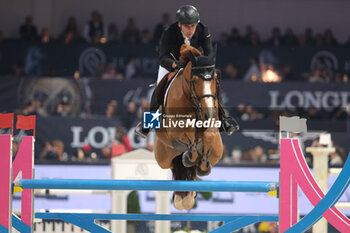 10/11/2024 - Mark McAuley riding Django Ste Hermelle in action during CSI5*- W Longines FEI Jumping World Cup 2024 Gran Prix presented by KASK, at Pala Fimauto on November 10, 2024, Verona, Italy. - CSI5*-W LONGINES FEI WORLD CUP™ PRESENTED BY KASK GRAN PRIX - INTERNAZIONALI - EQUITAZIONE