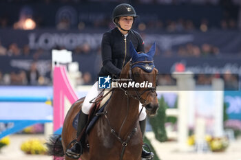 10/11/2024 - Jeanne Sadran riding Dexter de Kerglenn in action during CSI5*- W Longines FEI Jumping World Cup 2024 Gran Prix presented by KASK, at Pala Fimauto on November 10, 2024, Verona, Italy. - CSI5*-W LONGINES FEI WORLD CUP™ PRESENTED BY KASK GRAN PRIX - INTERNAZIONALI - EQUITAZIONE