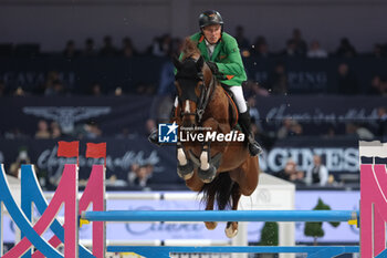 10/11/2024 - Gerfried Puck riding Equitron Naxcel V in action during CSI5*- W Longines FEI Jumping World Cup 2024 Gran Prix presented by KASK, at Pala Fimauto on November 10, 2024, Verona, Italy. - CSI5*-W LONGINES FEI WORLD CUP™ PRESENTED BY KASK GRAN PRIX - INTERNAZIONALI - EQUITAZIONE