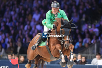 10/11/2024 - Gerfried Puck riding Equitron Naxcel V in action during CSI5*- W Longines FEI Jumping World Cup 2024 Gran Prix presented by KASK, at Pala Fimauto on November 10, 2024, Verona, Italy. - CSI5*-W LONGINES FEI WORLD CUP™ PRESENTED BY KASK GRAN PRIX - INTERNAZIONALI - EQUITAZIONE