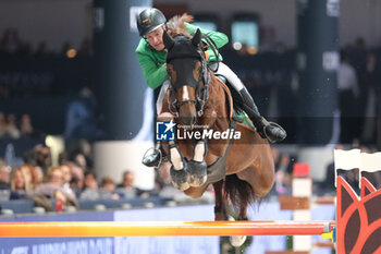 10/11/2024 - Gerfried Puck riding Equitron Naxcel V in action during CSI5*- W Longines FEI Jumping World Cup 2024 Gran Prix presented by KASK, at Pala Fimauto on November 10, 2024, Verona, Italy. - CSI5*-W LONGINES FEI WORLD CUP™ PRESENTED BY KASK GRAN PRIX - INTERNAZIONALI - EQUITAZIONE