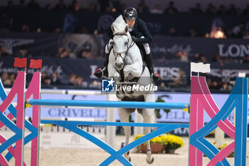 10/11/2024 - Maximilian Weishaupt riding DSP Omerta Incipit in action during CSI5*- W Longines FEI Jumping World Cup 2024 Gran Prix presented by KASK, at Pala Fimauto on November 10, 2024, Verona, Italy. - CSI5*-W LONGINES FEI WORLD CUP™ PRESENTED BY KASK GRAN PRIX - INTERNAZIONALI - EQUITAZIONE