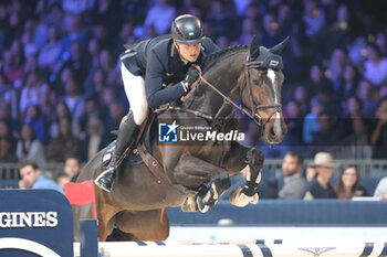 10/11/2024 - Max Kuhner riding EIC Julius Caesar in action during CSI5*- W Longines FEI Jumping World Cup 2024 Gran Prix presented by KASK, at Pala Fimauto on November 10, 2024, Verona, Italy. - CSI5*-W LONGINES FEI WORLD CUP™ PRESENTED BY KASK GRAN PRIX - INTERNAZIONALI - EQUITAZIONE