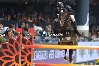 10/11/2024 - Max Kuhner riding EIC Julius Caesar in action during CSI5*- W Longines FEI Jumping World Cup 2024 Gran Prix presented by KASK, at Pala Fimauto on November 10, 2024, Verona, Italy. - CSI5*-W LONGINES FEI WORLD CUP™ PRESENTED BY KASK GRAN PRIX - INTERNAZIONALI - EQUITAZIONE