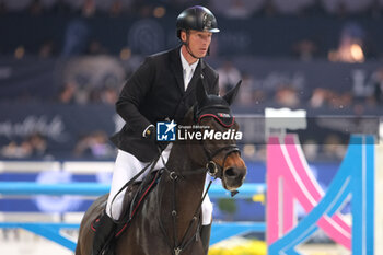 10/11/2024 - Alain Jufer riding Dante MM in action during CSI5*- W Longines FEI Jumping World Cup 2024 Gran Prix presented by KASK, at Pala Fimauto on November 10, 2024, Verona, Italy. - CSI5*-W LONGINES FEI WORLD CUP™ PRESENTED BY KASK GRAN PRIX - INTERNAZIONALI - EQUITAZIONE