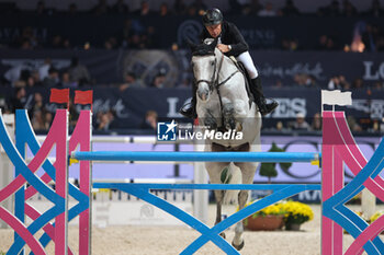 10/11/2024 - Rolf-Goran Bengtsson riding Zuccero HV in action during CSI5*- W Longines FEI Jumping World Cup 2024 Gran Prix presented by KASK, at Pala Fimauto on November 10, 2024, Verona, Italy. - CSI5*-W LONGINES FEI WORLD CUP™ PRESENTED BY KASK GRAN PRIX - INTERNAZIONALI - EQUITAZIONE