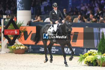 10/11/2024 - Marcus Ehning riding Coolio 42 in action during CSI5*- W Longines FEI Jumping World Cup 2024 Gran Prix presented by KASK, at Pala Fimauto on November 10, 2024, Verona, Italy. - CSI5*-W LONGINES FEI WORLD CUP™ PRESENTED BY KASK GRAN PRIX - INTERNAZIONALI - EQUITAZIONE