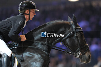 10/11/2024 - Marcus Ehning riding Coolio 42 in action during CSI5*- W Longines FEI Jumping World Cup 2024 Gran Prix presented by KASK, at Pala Fimauto on November 10, 2024, Verona, Italy. - CSI5*-W LONGINES FEI WORLD CUP™ PRESENTED BY KASK GRAN PRIX - INTERNAZIONALI - EQUITAZIONE