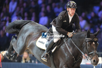 10/11/2024 - Marcus Ehning riding Coolio 42in action during CSI5*- W Longines FEI Jumping World Cup 2024 Gran Prix presented by KASK, at Pala Fimauto on November 10, 2024, Verona, Italy. - CSI5*-W LONGINES FEI WORLD CUP™ PRESENTED BY KASK GRAN PRIX - INTERNAZIONALI - EQUITAZIONE